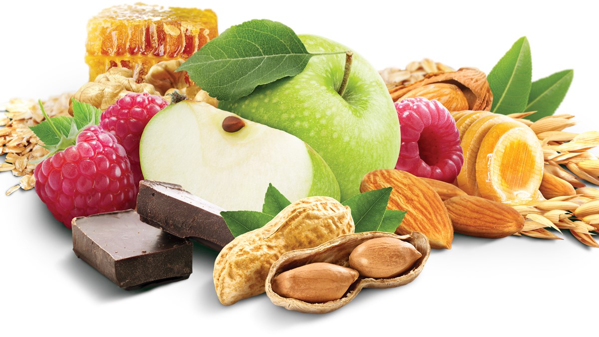 Ingredients A graphic of a collection of assorted ingredients: honeycomb, oats, wheat, apples, raspberries, almonds, peanuts, and dark chocolate.